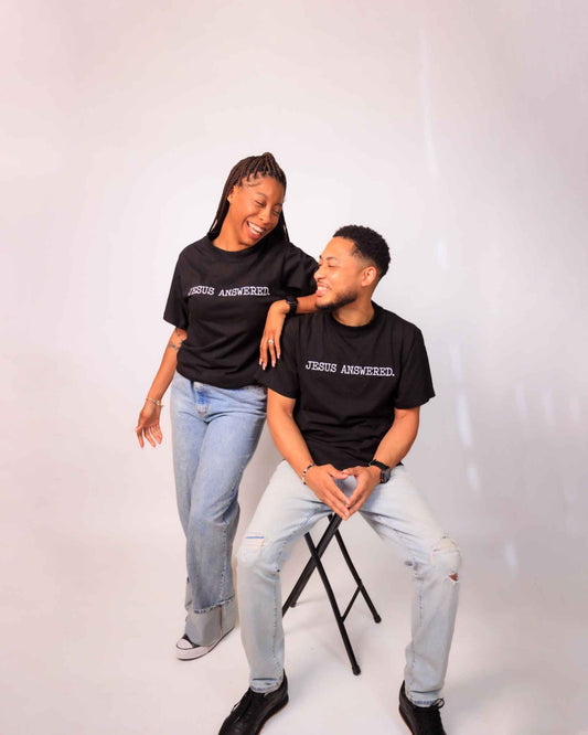 Black shirt and white words